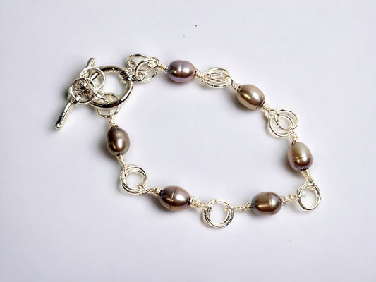Peacock pearl bracelet, 5-6mm rice pearls, silver platted toggle clasp