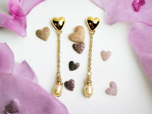 Freshwater Peach Pearls drop earrings on gold hearts