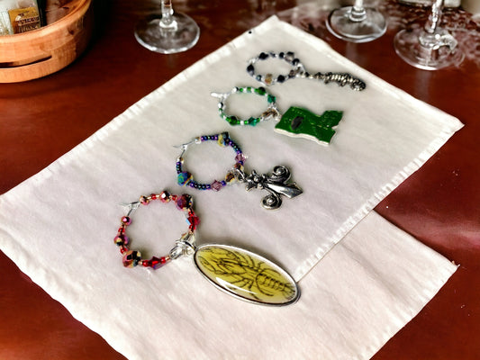 Louisiana themed enamel wine glass charms, each charm has its character, color and accents beads. Handmade wine charms.