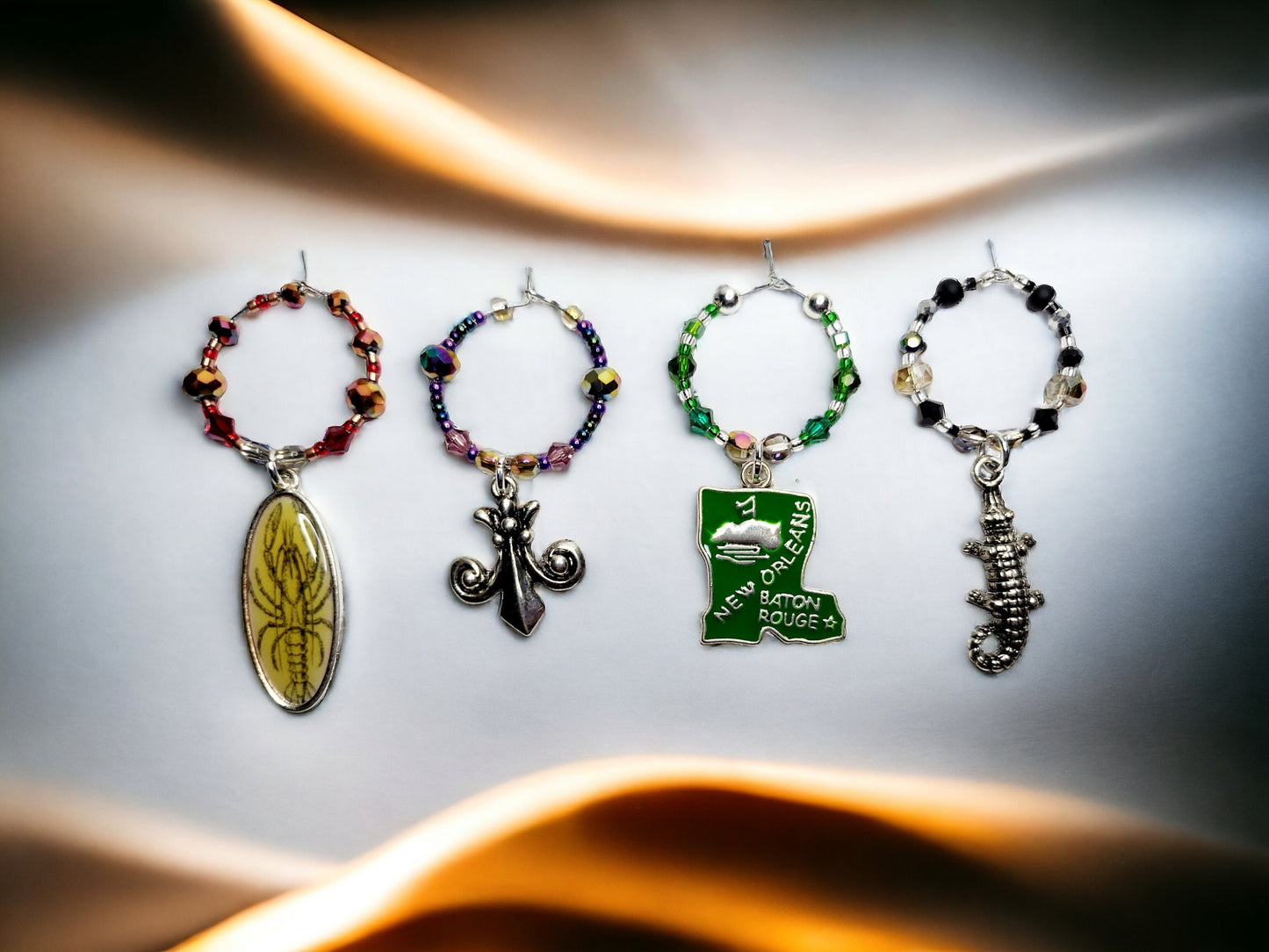 Louisiana themed enamel wine glass charms, each charm has its character, color and accents beads. Handmade wine charms.