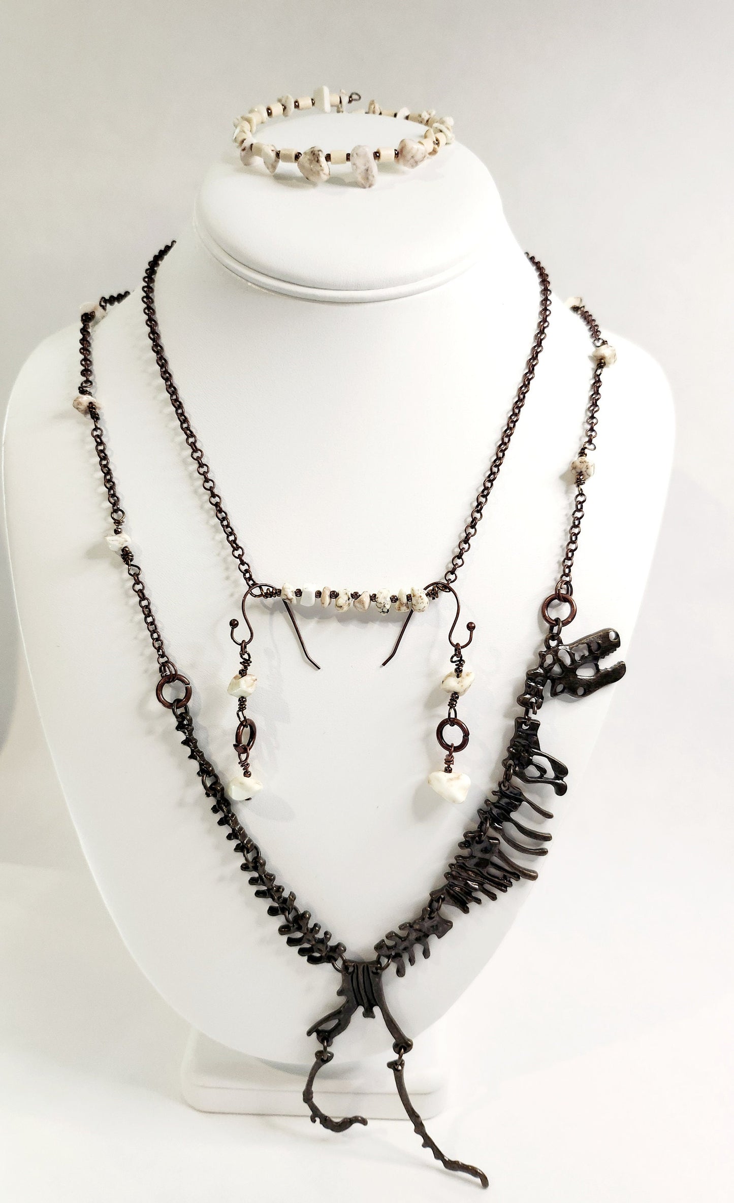 Bronze dinosaur necklace focal on howlite beaded antique bronze chain 24 inch length