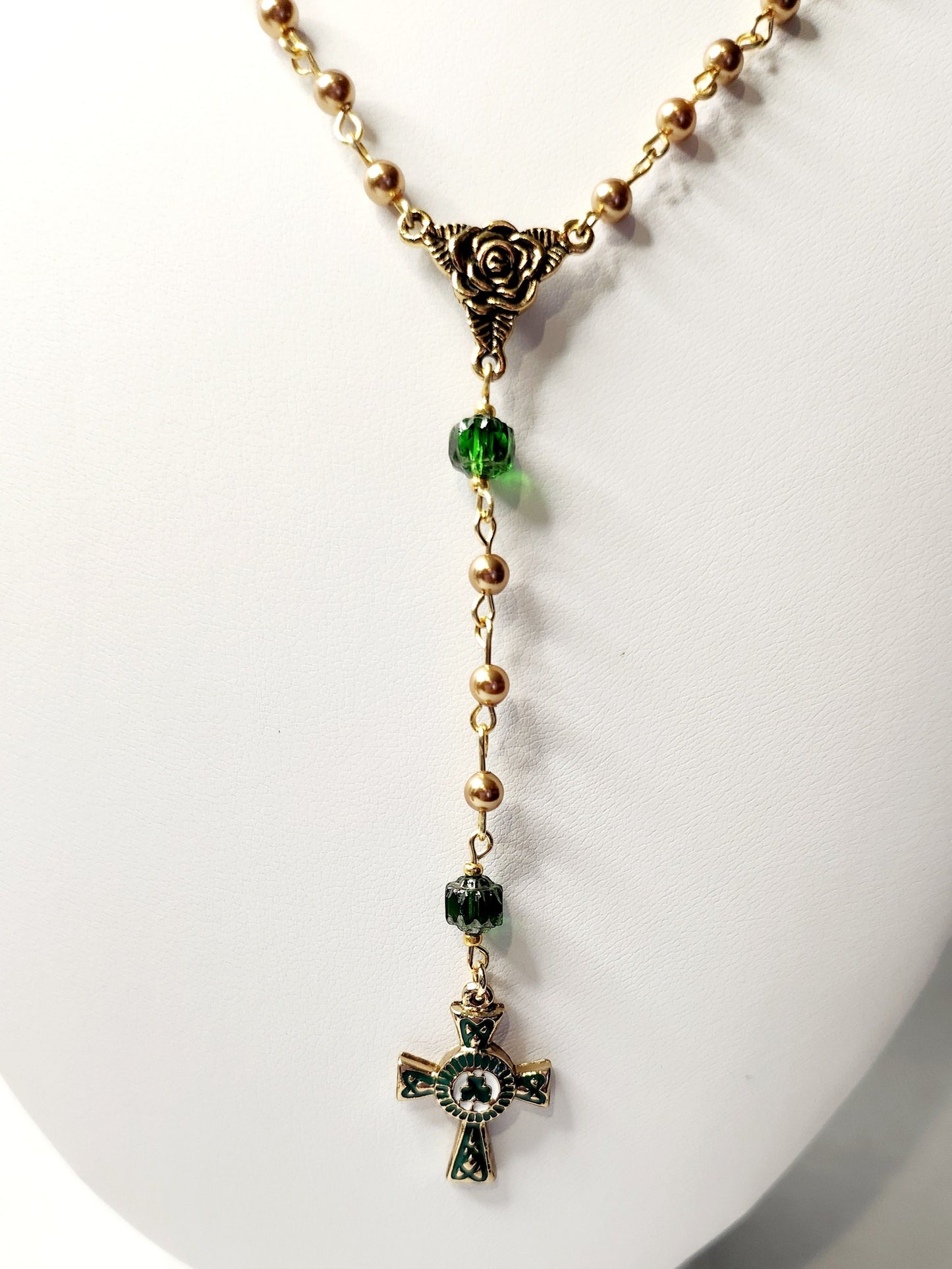 Handmade Gold and Green czech glass beaded rosary with gold trinity rose connector and white, green and gold enameled Celtic cross.
