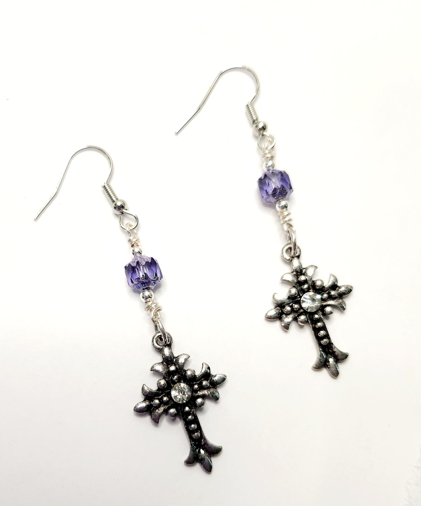 Antiqued silver cross and rhinestone earrings with purple Czech cathedral beading