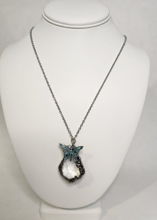 Cut Crystal Pendant in "pewter" with blue enamel butterfly in silver
