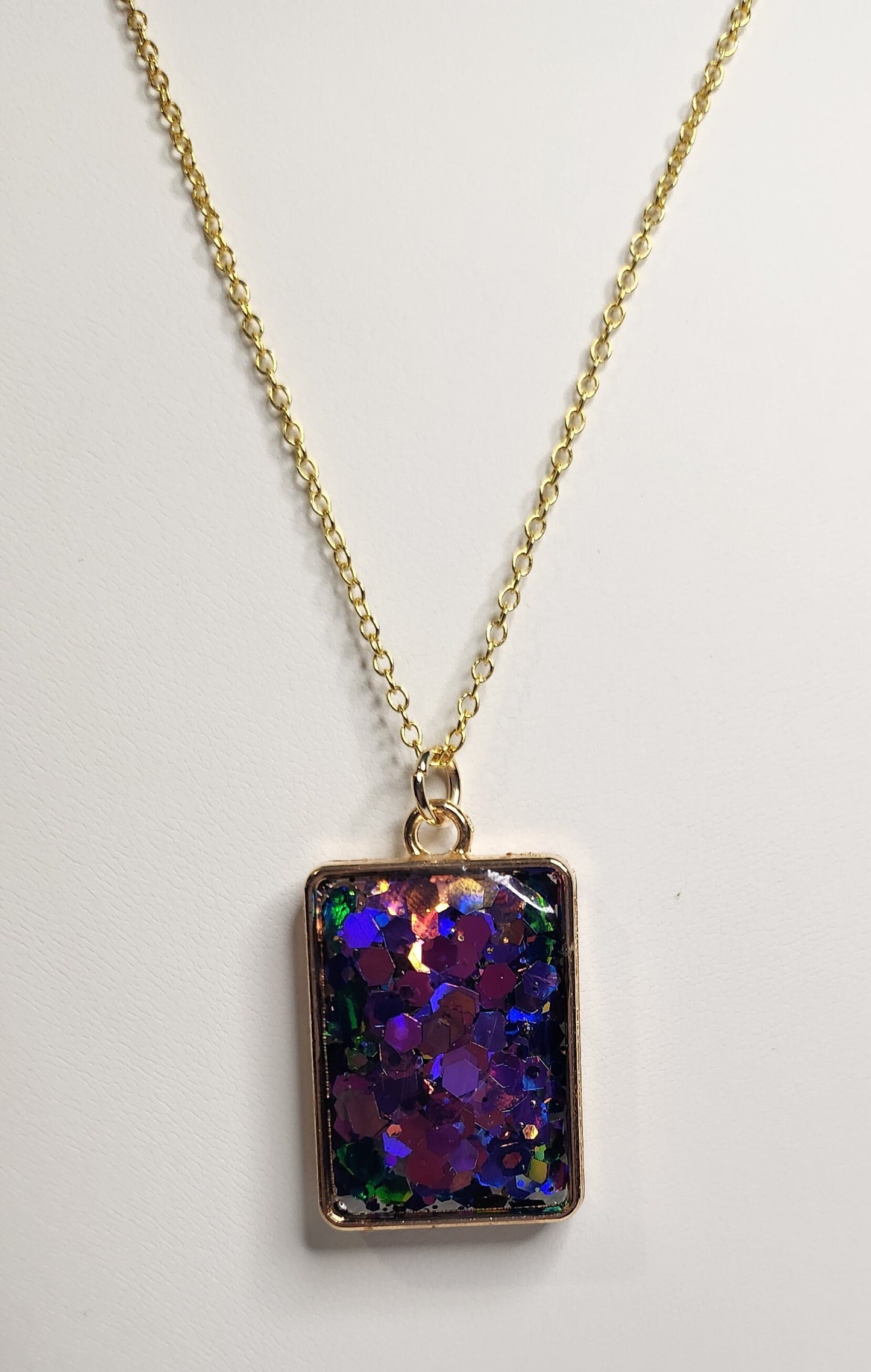 Purple glitter resin pendant in gold square bezel, 18kt gold plated necklace