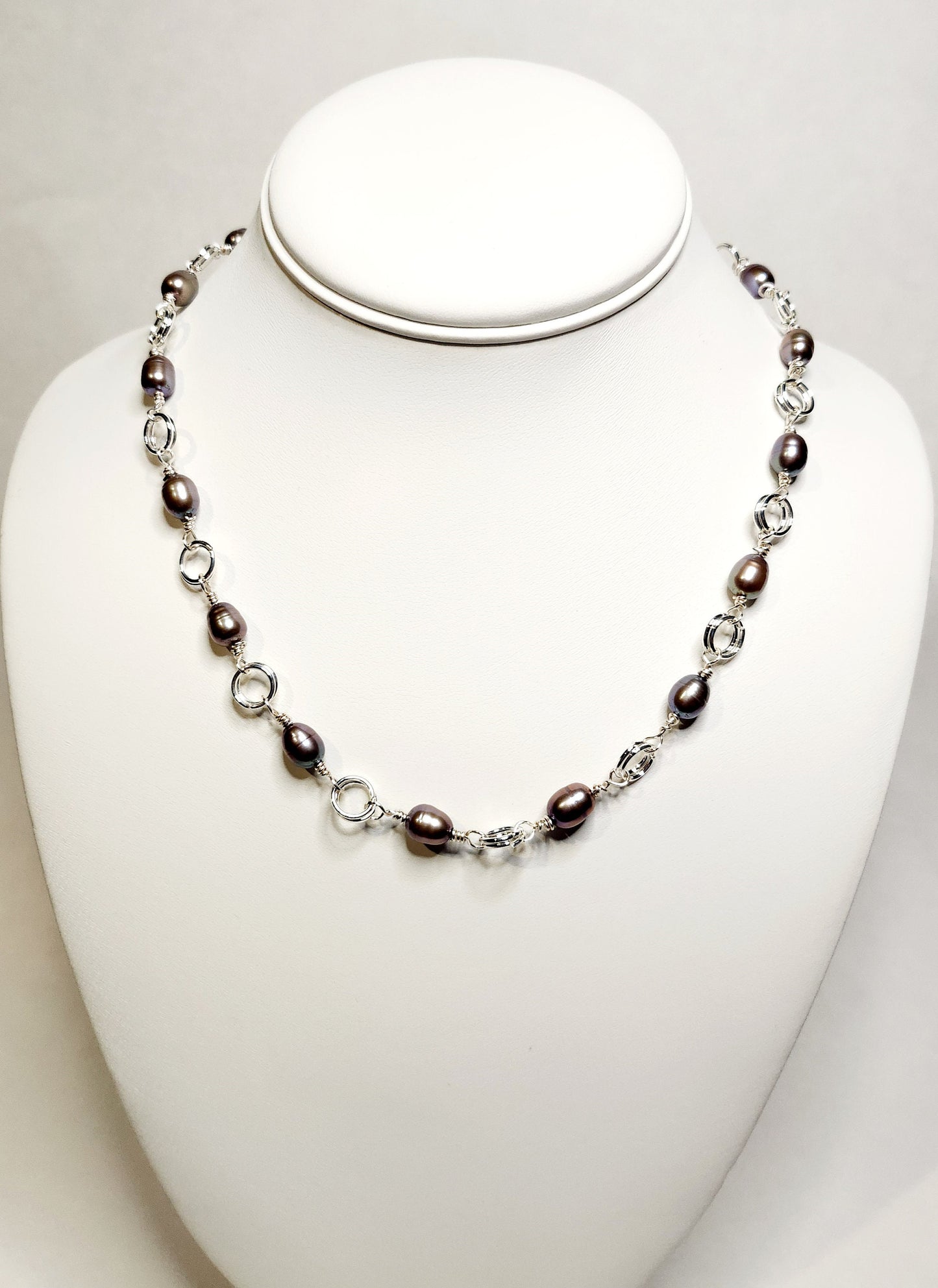 Cultured Freshwater Peacock pearl, 5-6mm rice pearls, 18inch necklace, silver plated, with a lobster claw clasp.