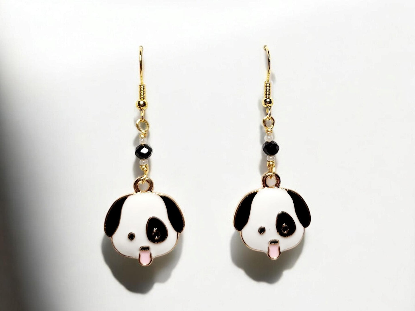 Black and White dog charm dangle earrings and black faceted glass beading.