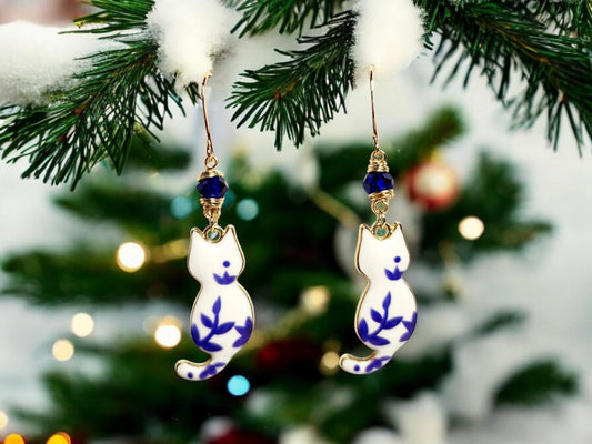 White and blue porcelian themed cat charm dangle earrings with blue beading