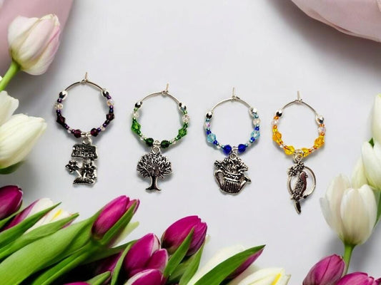 Garden themed wine charms, set of 4 on silver plated holders, in purple, green, blue and yellow