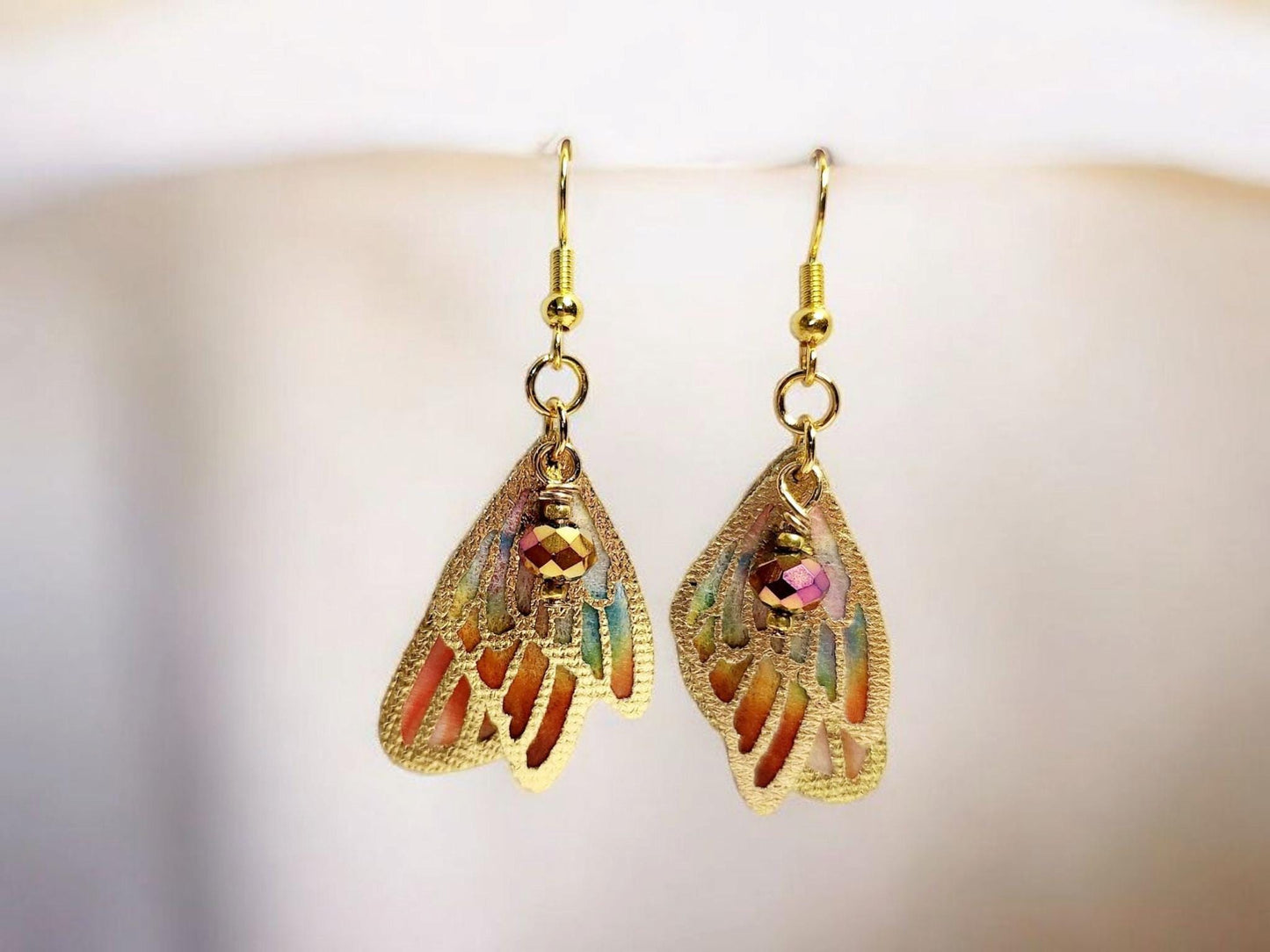 Butterfly Wing Dangle Earrings in Golden Amber with faceted beading