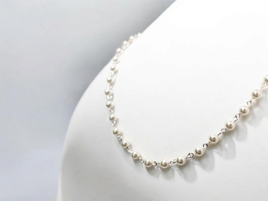 Opera length white crystal pearl necklace with silver links