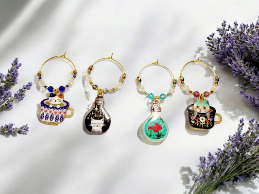 Whimsical Cat wine charms with crystal embellishments-Set of 4 gold plated wine charms in blue, grey, teal and purple crystals.