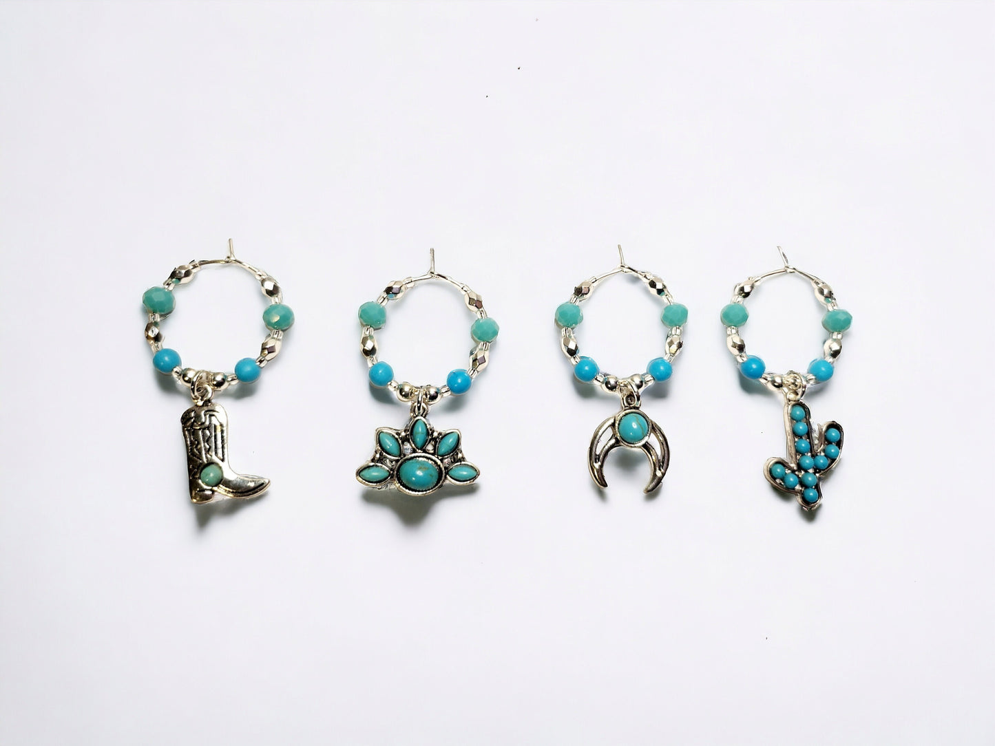 Southwestern themed handmade wine charms in silver and turquoise manganese beading.