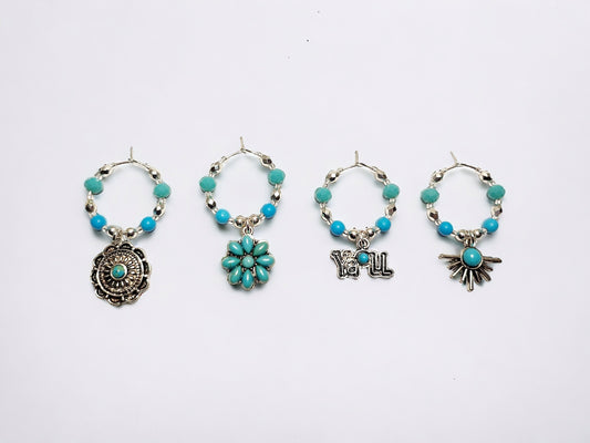 Southwestern themed handmade wine charms in silver and turquoise manganese beading.