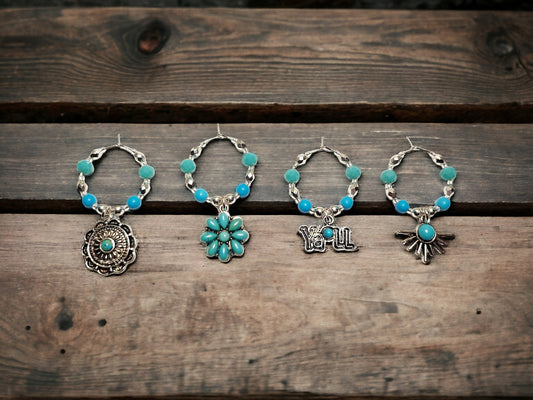 Southwestern themed handmade wine charms in silver and turquoise manganese beading.