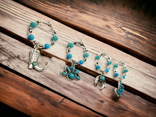 Southwestern themed handmade wine charms in silver and turquoise manganese beading.