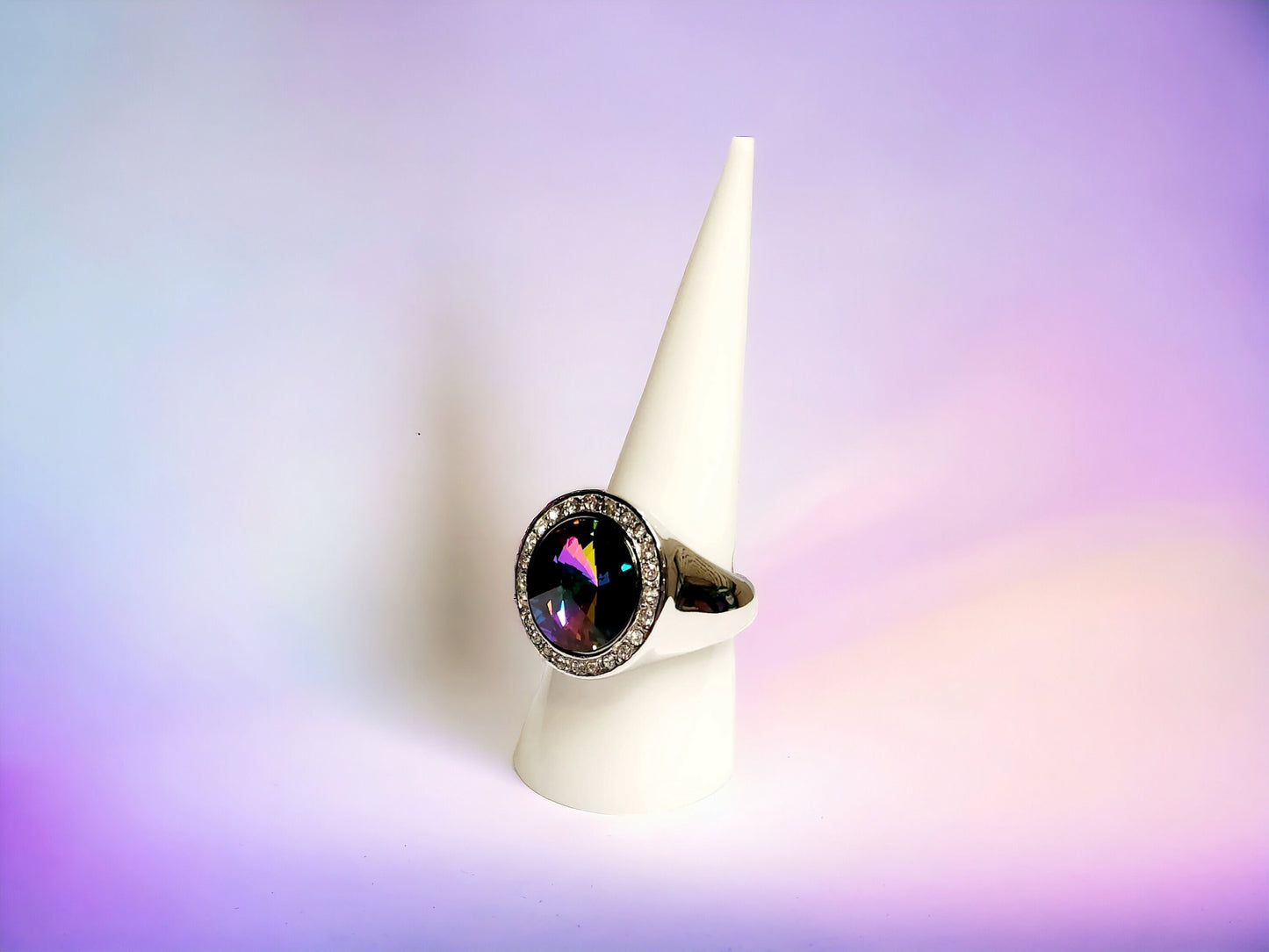 Electra Cyrstal 14mm Rivoli ring set in silver tone ring with rhinestone bezel