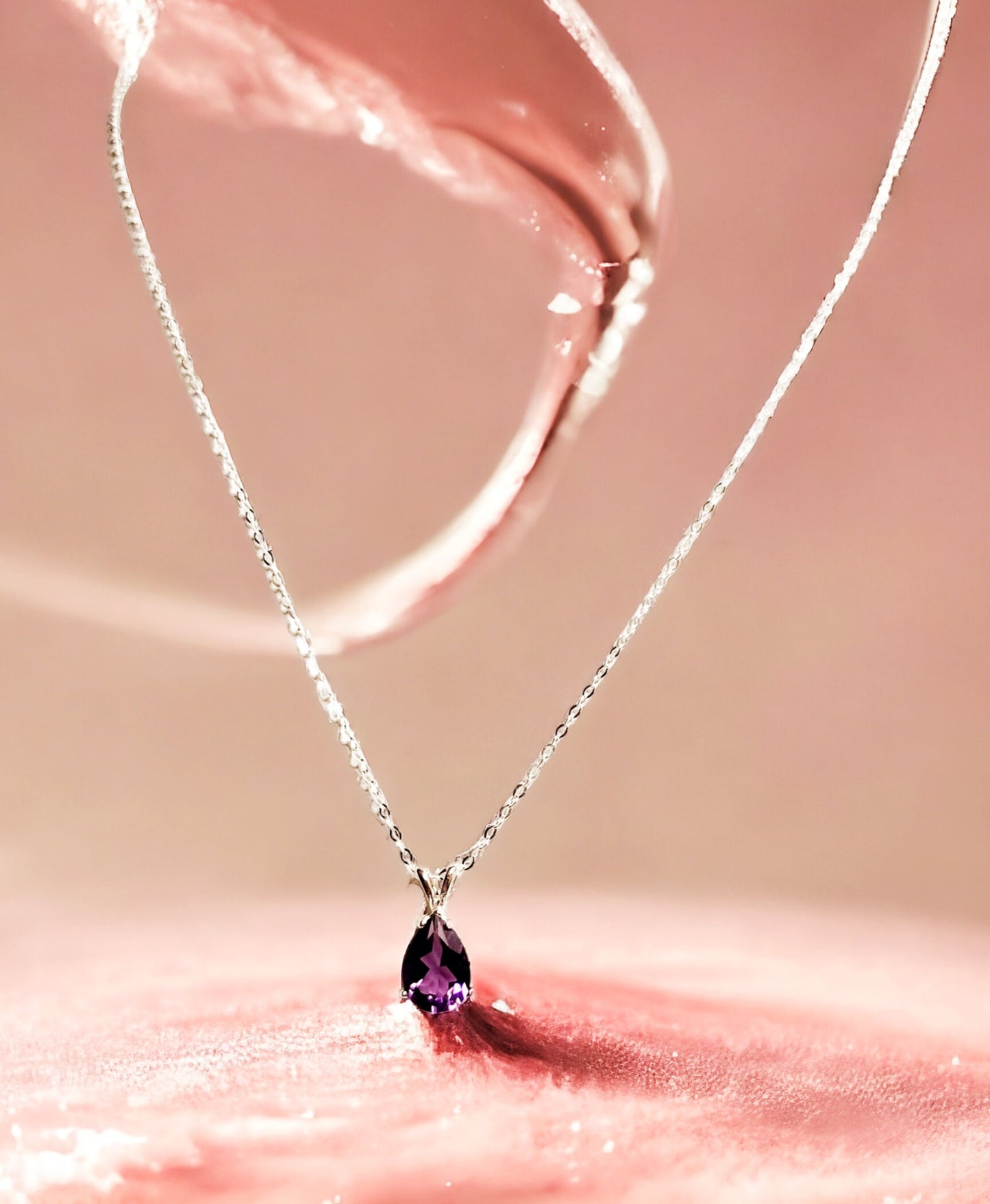 Natural Amethyst Pear shaped pendant 10x7mm set in sterling silver, with 16 inch sterling silver chain