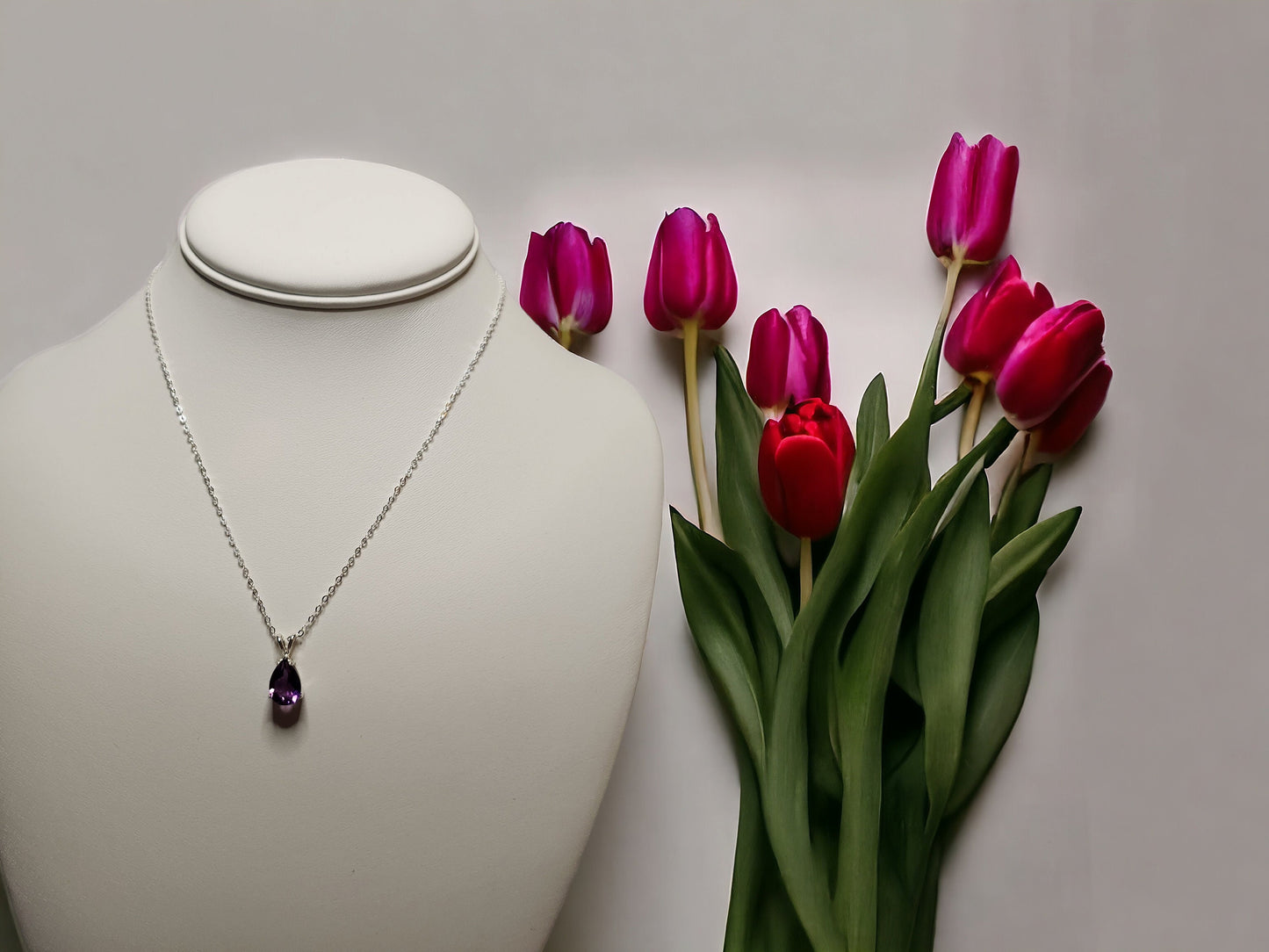 Natural Amethyst Pear shaped pendant 10x7mm set in sterling silver, with 16 inch sterling silver chain