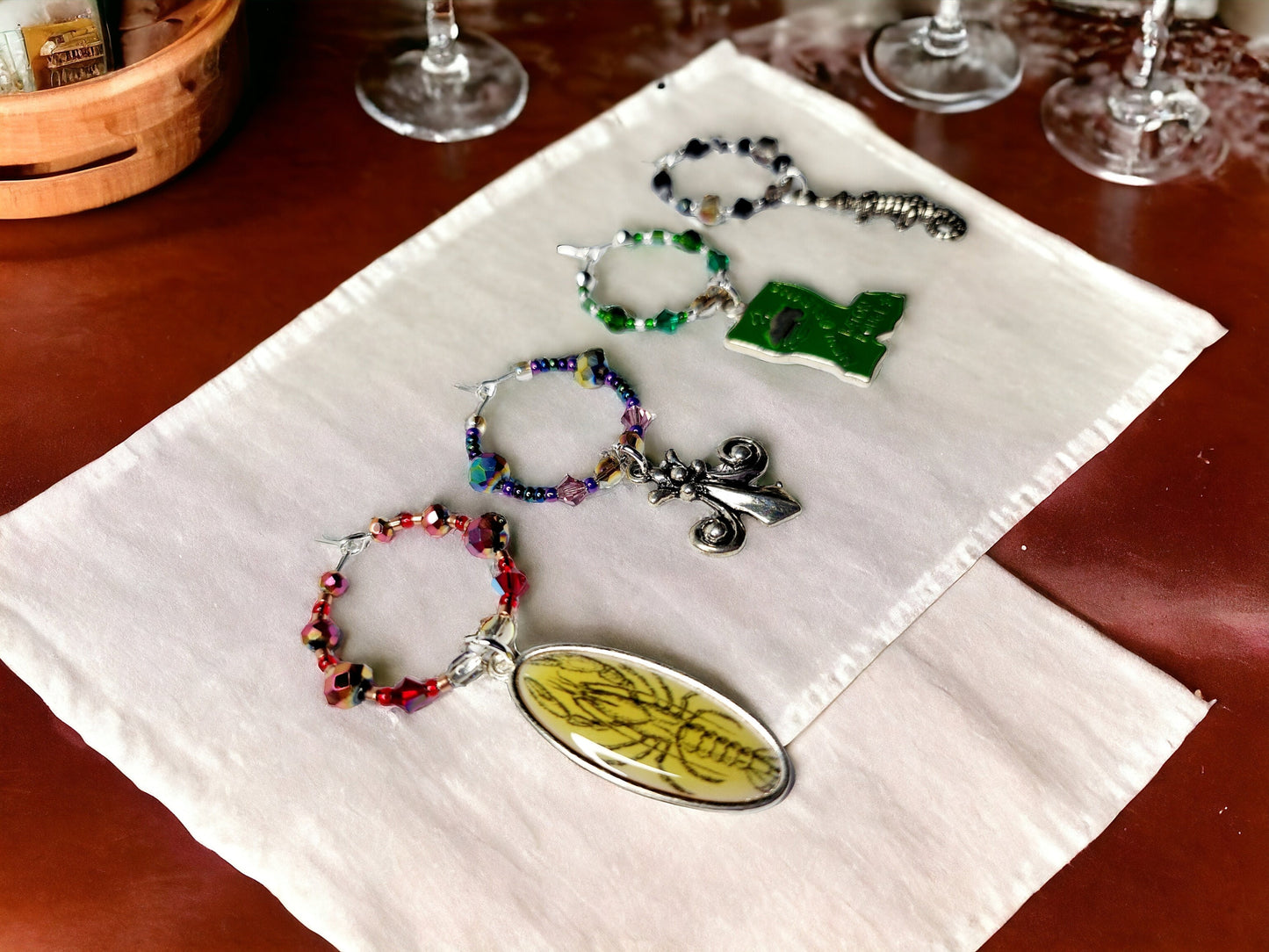 Louisiana themed enamel wine glass charms, each charm has its character, color and accents beads. Handmade wine charms.