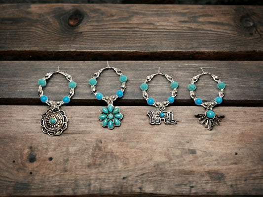 Southwestern themed handmade wine charms in silver and turquoise manganese beading.