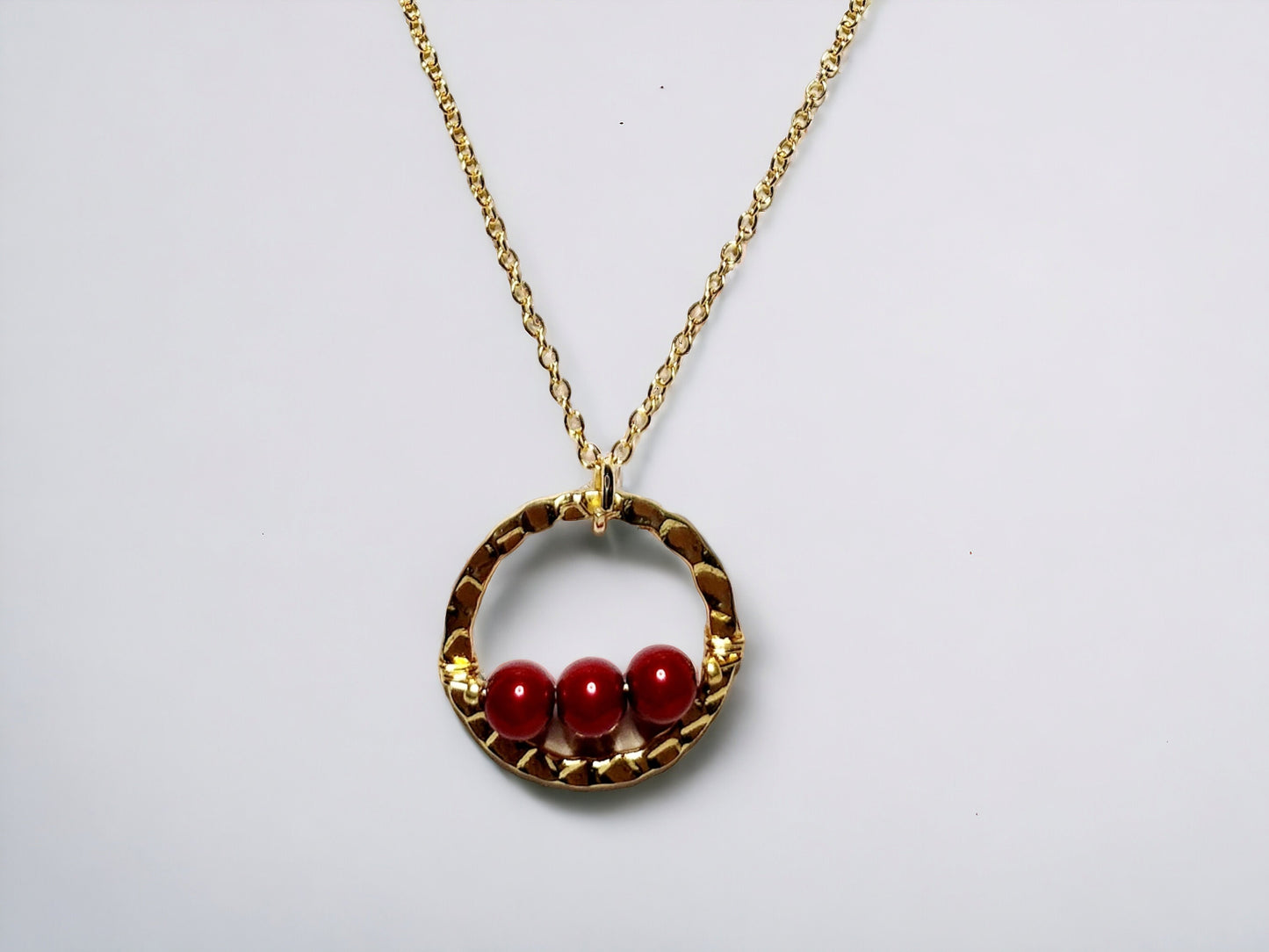 Red Pearl bar on gold hammered circle pendant on 20inch gold plated curb chain necklace