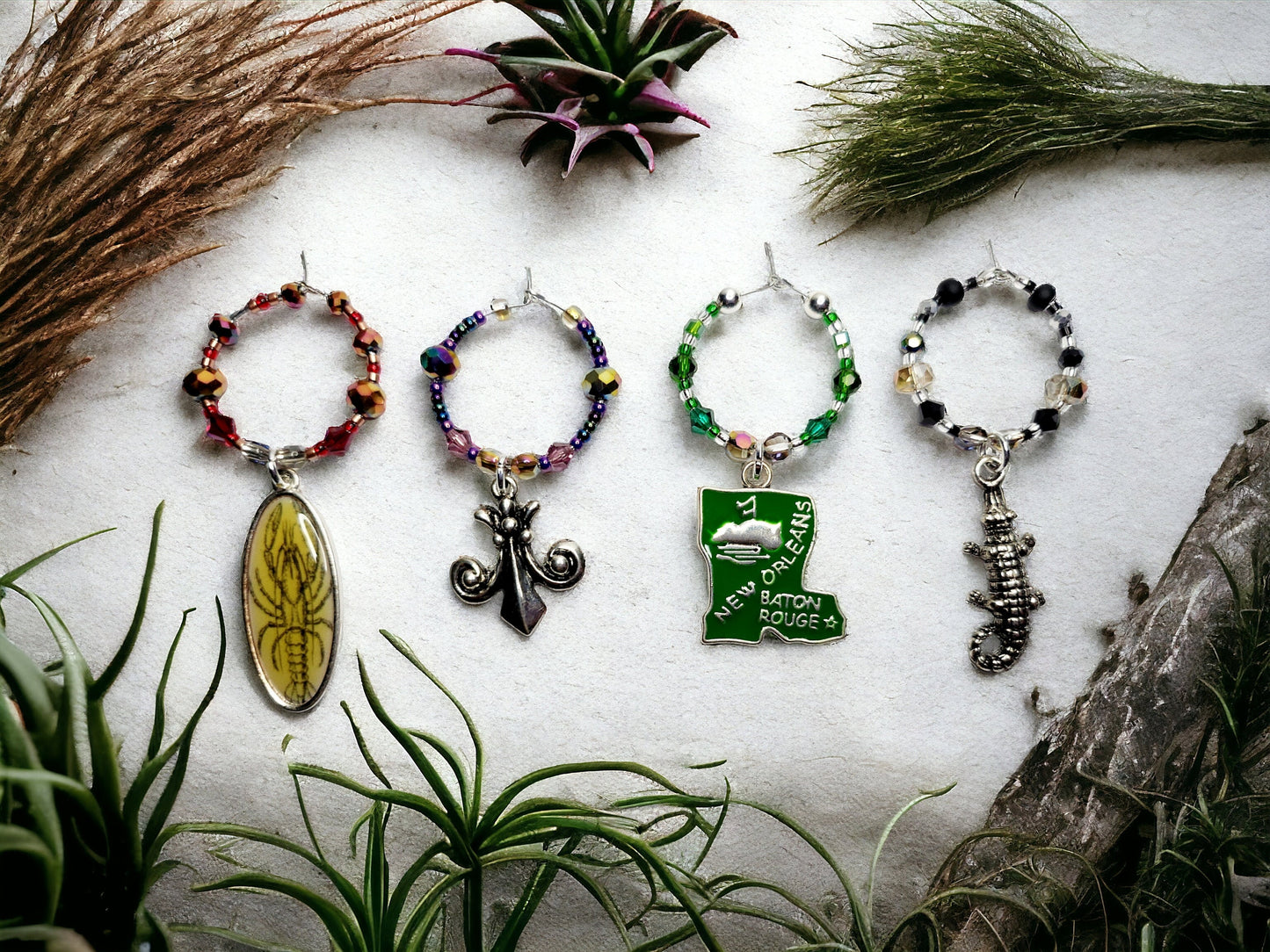 Louisiana themed enamel wine glass charms, each charm has its character, color and accents beads. Handmade wine charms.
