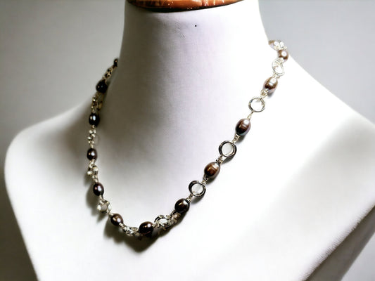 Cultured Freshwater Peacock pearl, 5-6mm rice pearls, 18inch necklace, silver plated, with a lobster claw clasp.
