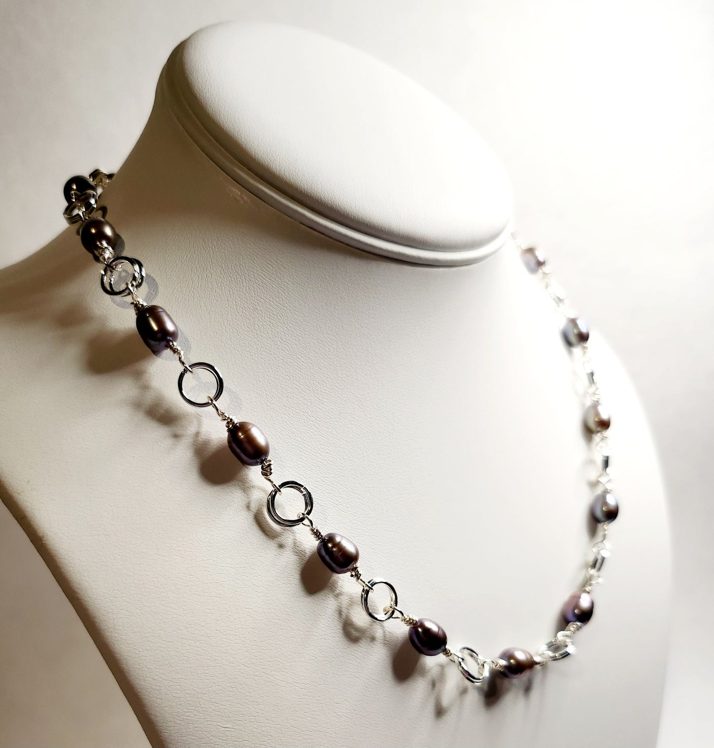 Cultured Freshwater Peacock pearl, 5-6mm rice pearls, 18inch necklace, silver plated, with a lobster claw clasp.