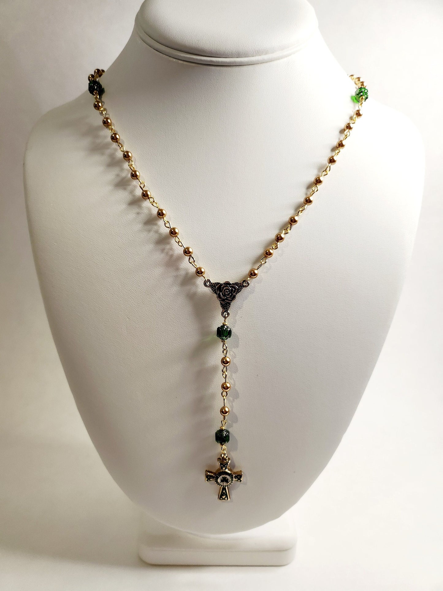 Handmade Gold and Green czech glass beaded rosary with gold trinity rose connector and white, green and gold enameled Celtic cross.