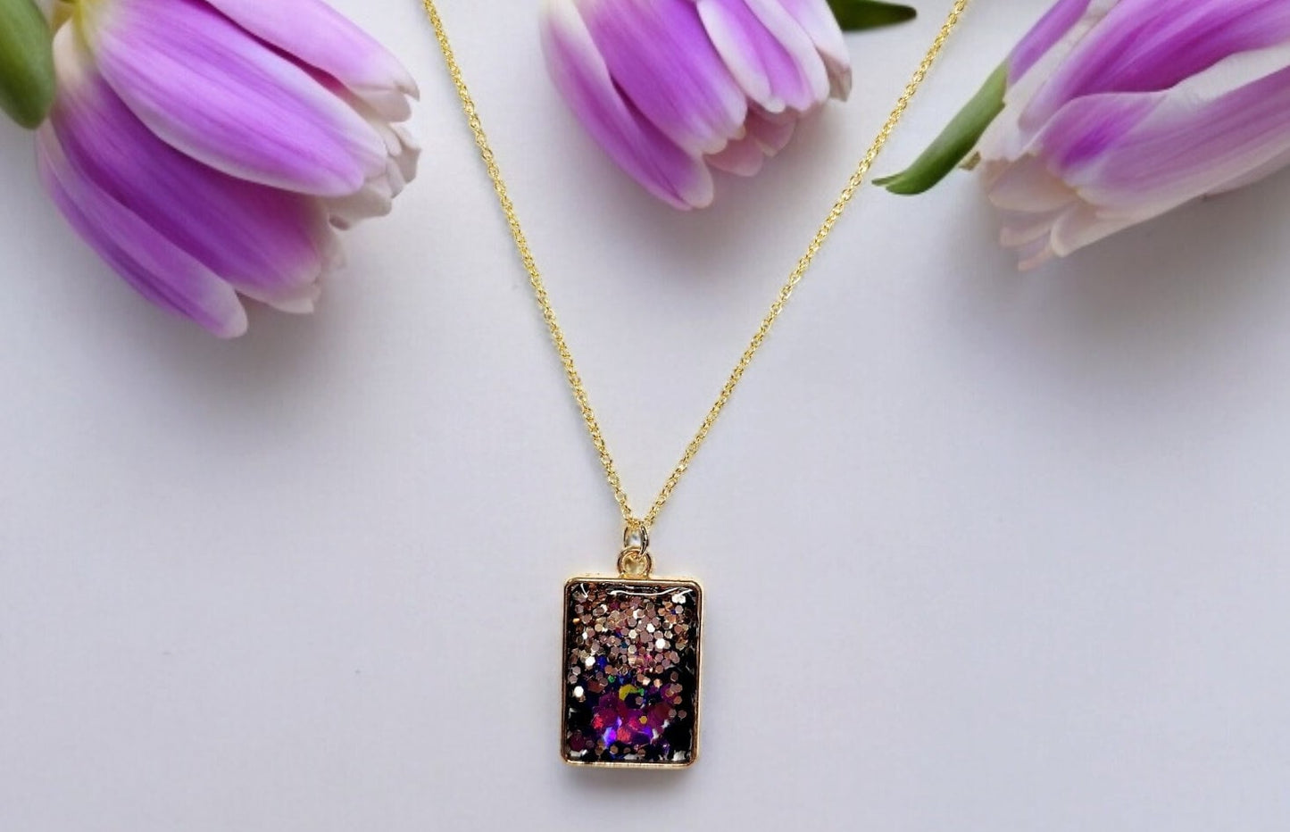 Purple glitter resin pendant in gold square bezel, 18kt gold plated necklace