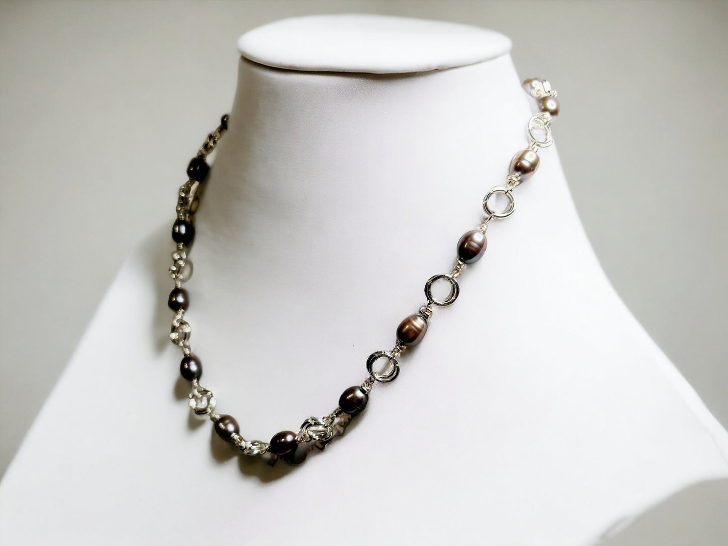 Cultured Freshwater Peacock pearl, 5-6mm rice pearls, 18inch necklace, silver plated, with a lobster claw clasp.