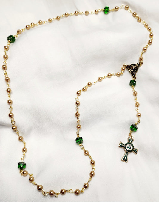 Handmade Gold and Green czech glass beaded rosary with gold trinity rose connector and white, green and gold enameled Celtic cross.