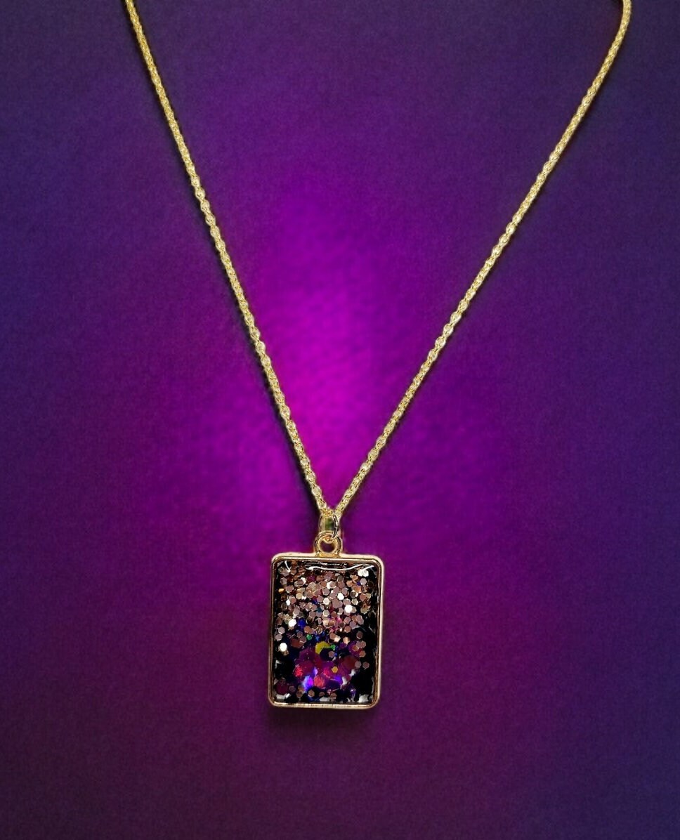 Purple glitter resin pendant in gold square bezel, 18kt gold plated necklace