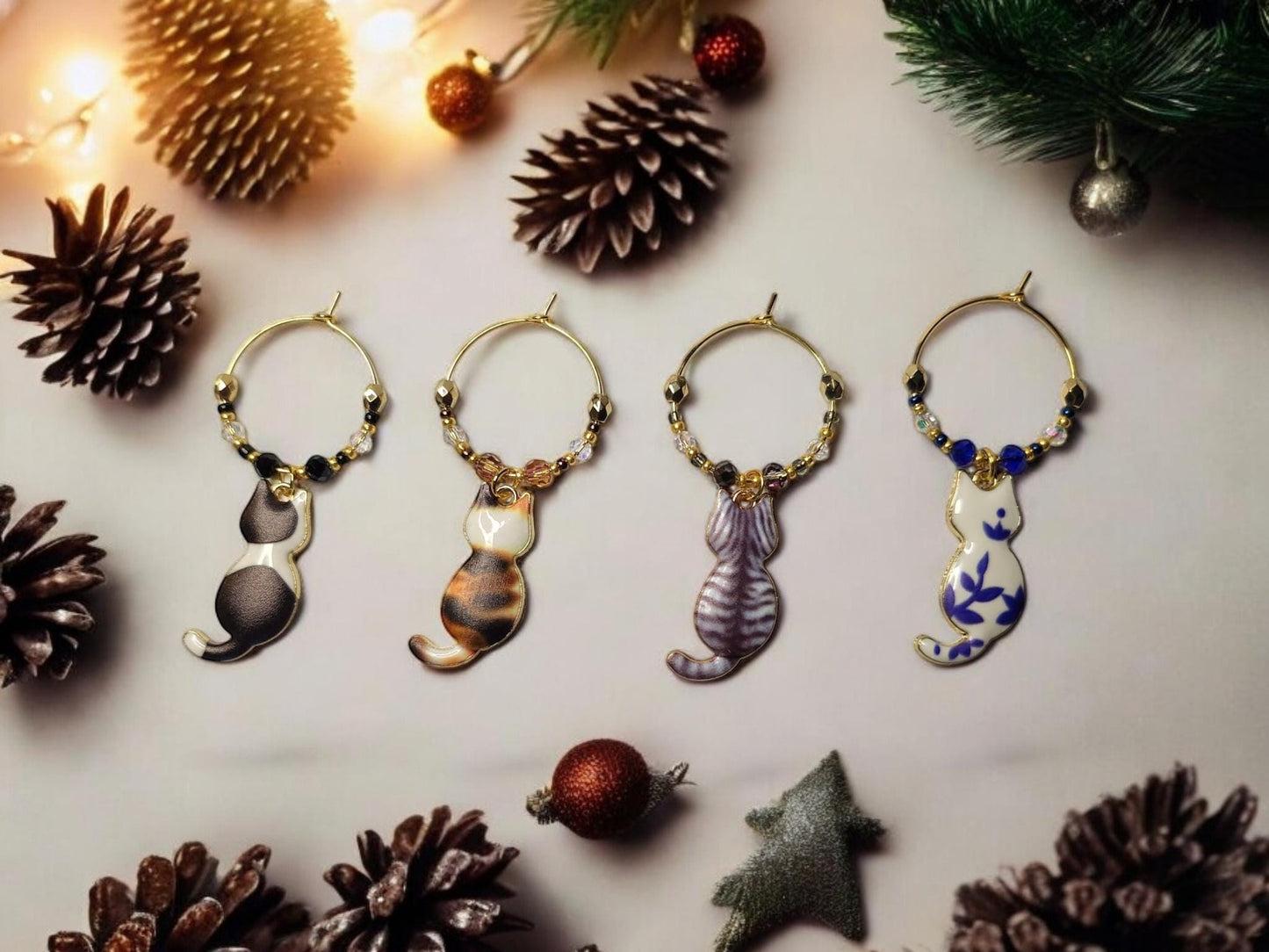 Cat wine charms with crystal embellishments-Set of 4 gold plated wine charms with a calico, tabby, blk/white and blue/wht porcelain designs