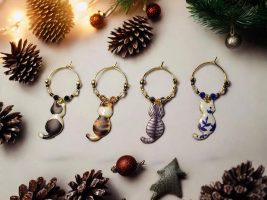 Cat wine charms with crystal embellishments-Set of 4 gold plated wine charms with a calico, tabby, blk/white and blue/wht porcelain designs