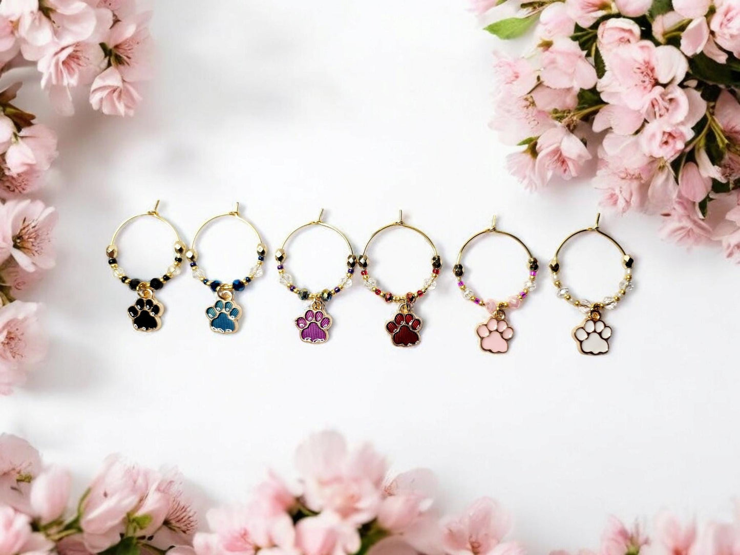 Paw print wine charms with crystal embellishments-Set of 6 gold plated wine charms in black, blue, purple, red, pink and white.