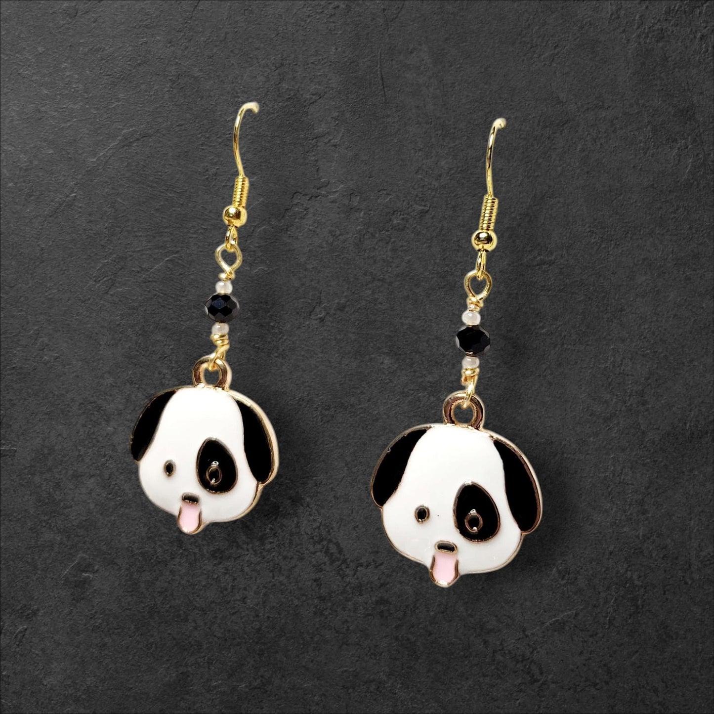 Black and White dog charm dangle earrings and black faceted glass beading.