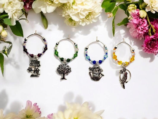 Garden themed wine charms, set of 4 on silver plated holders, in purple, green, blue and yellow