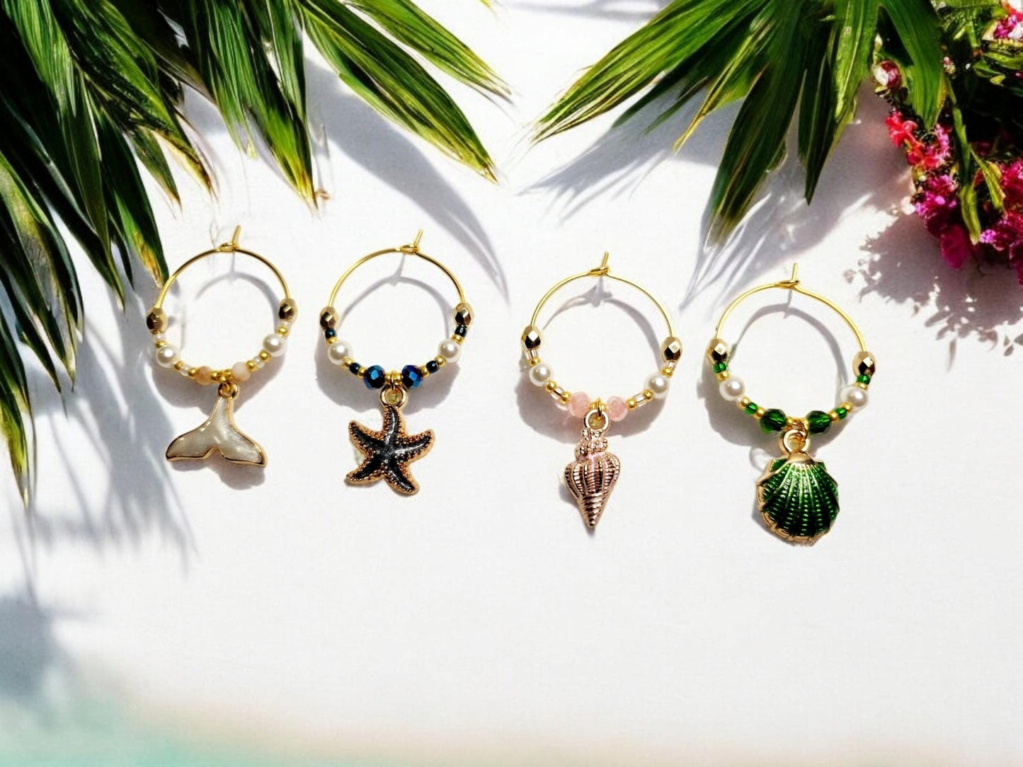 Mermaid Ocean theme enamel Wine charms, set of 4 in of white, blue, pink and green.