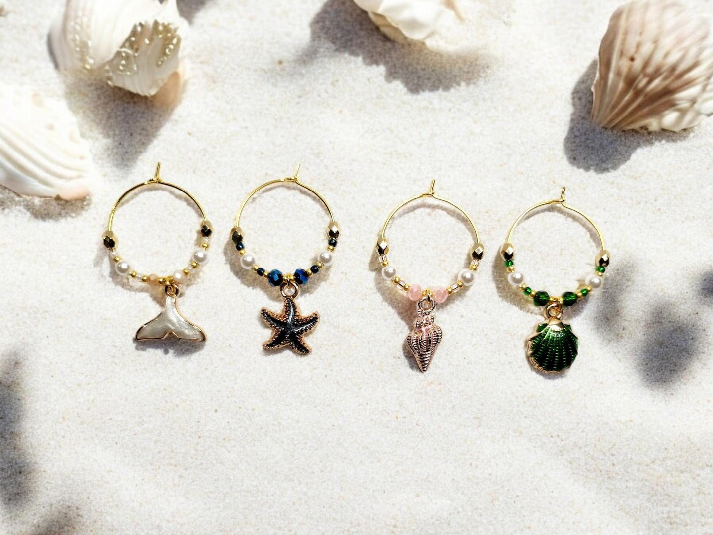 Mermaid Ocean theme enamel Wine charms, set of 4 in of white, blue, pink and green.