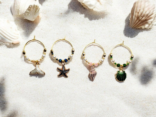 Mermaid Ocean theme enamel Wine charms, set of 4 in of white, blue, pink and green.