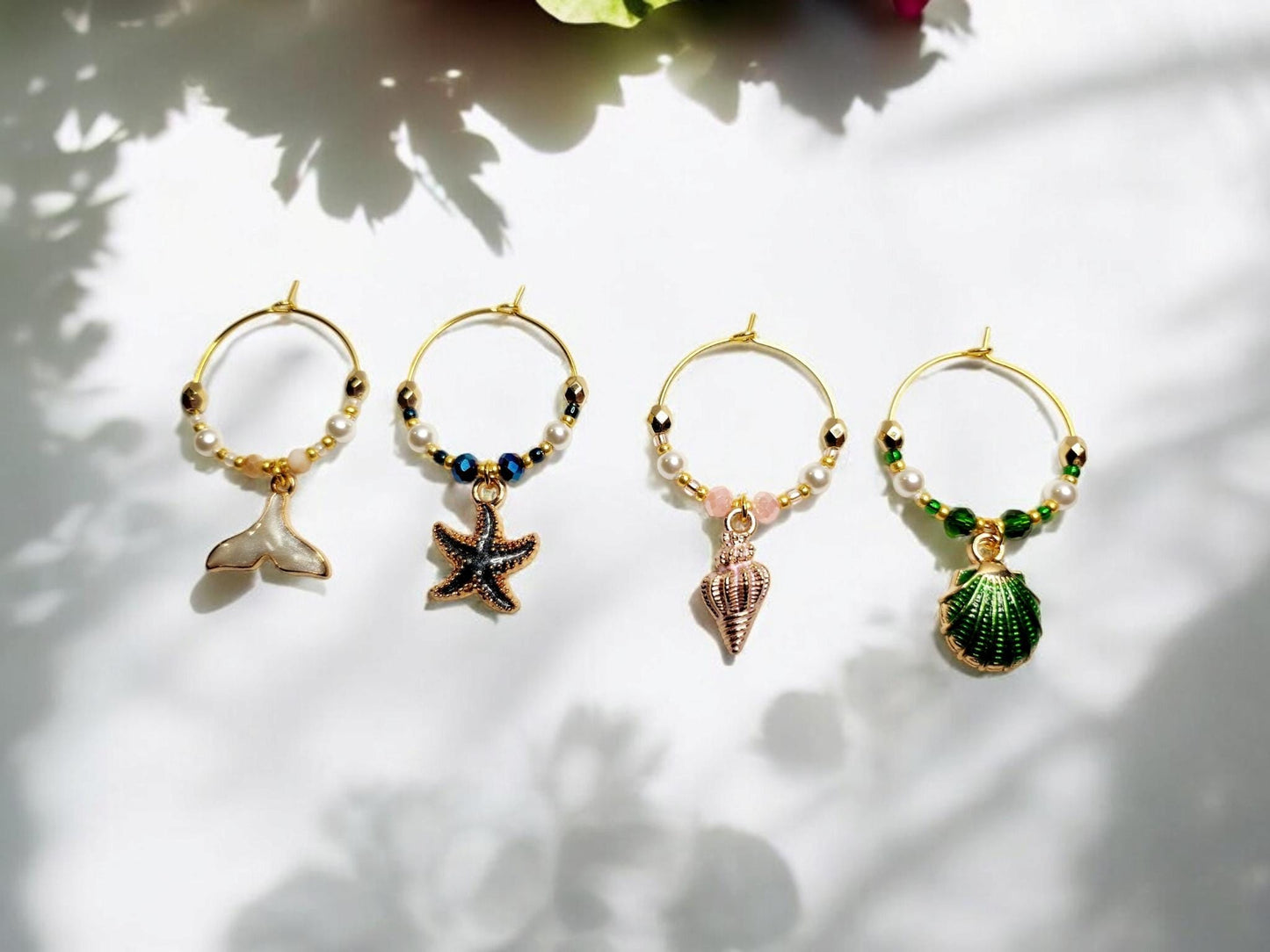 Mermaid Ocean theme enamel Wine charms, set of 4 in of white, blue, pink and green.