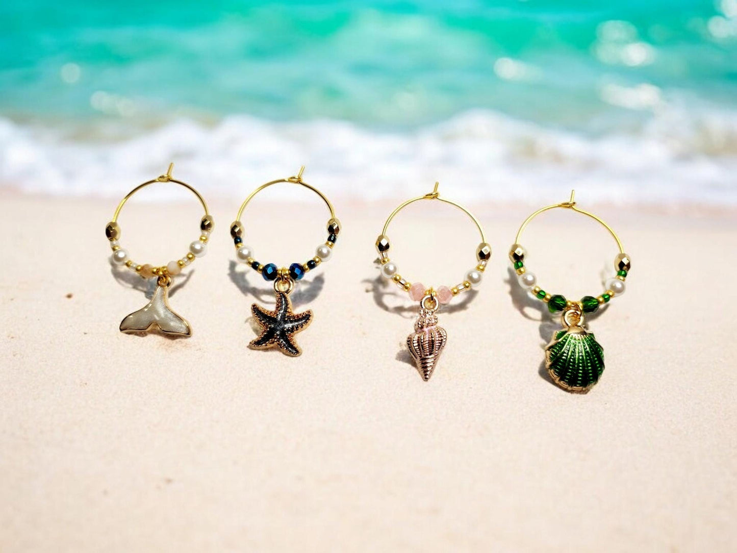 Mermaid Ocean theme enamel Wine charms, set of 4 in of white, blue, pink and green.