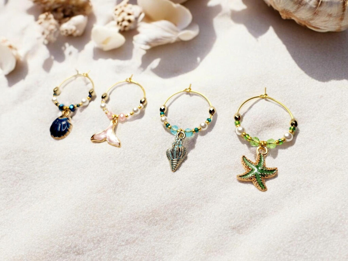 Mermaid Ocean theme enamel Wine charms, set of 4 in of blue, pink, light blue and green.