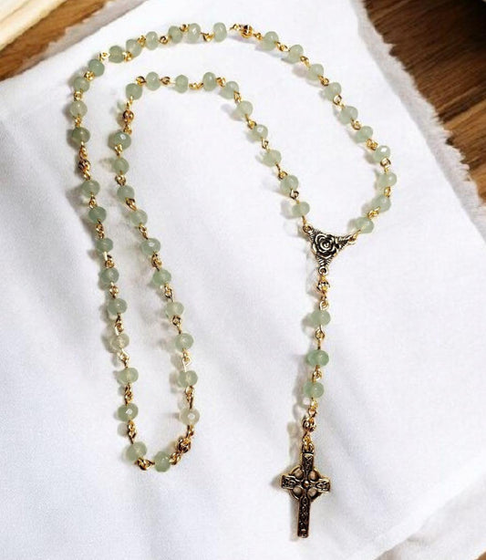 Green aventurine gemstone and gold beaded rosary with gold trinity rose connector and gold Celtic cross.