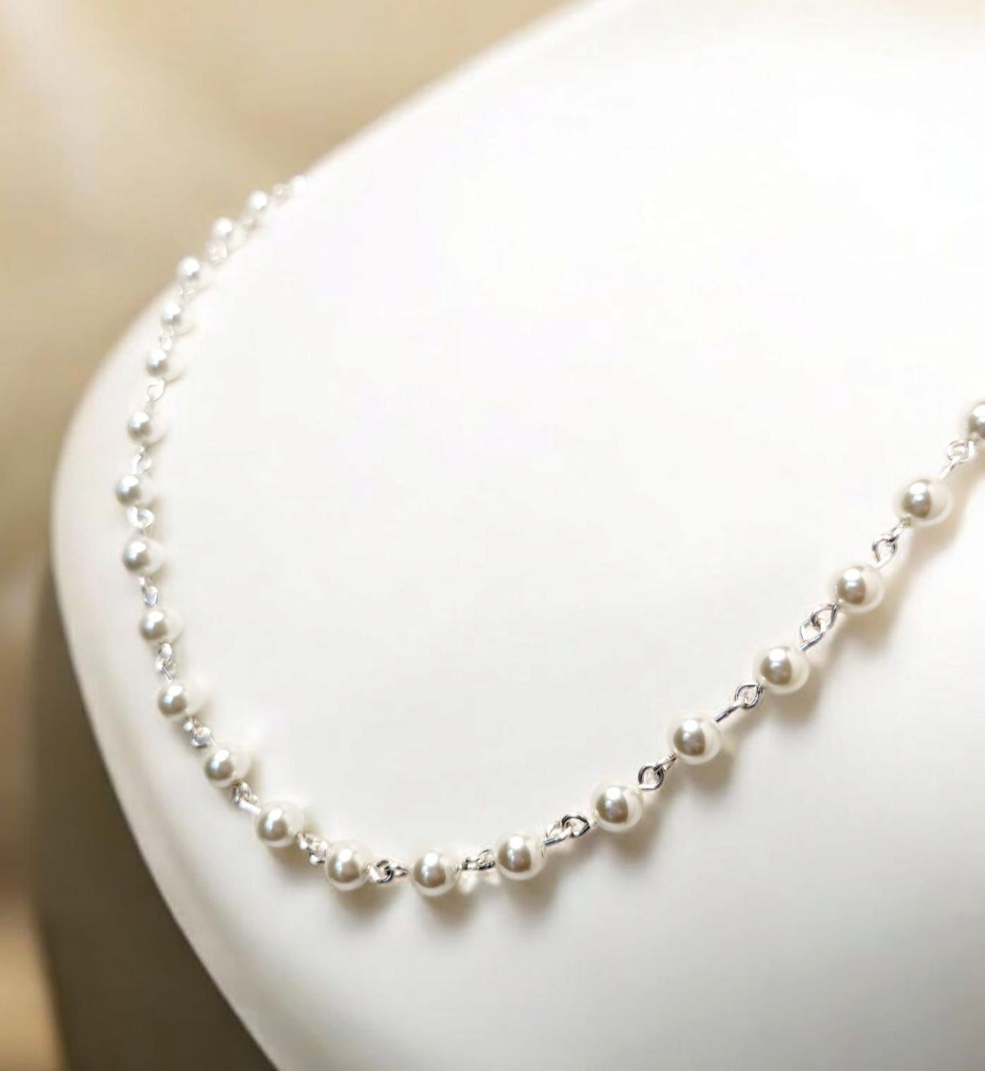 Opera length white crystal pearl necklace with silver links