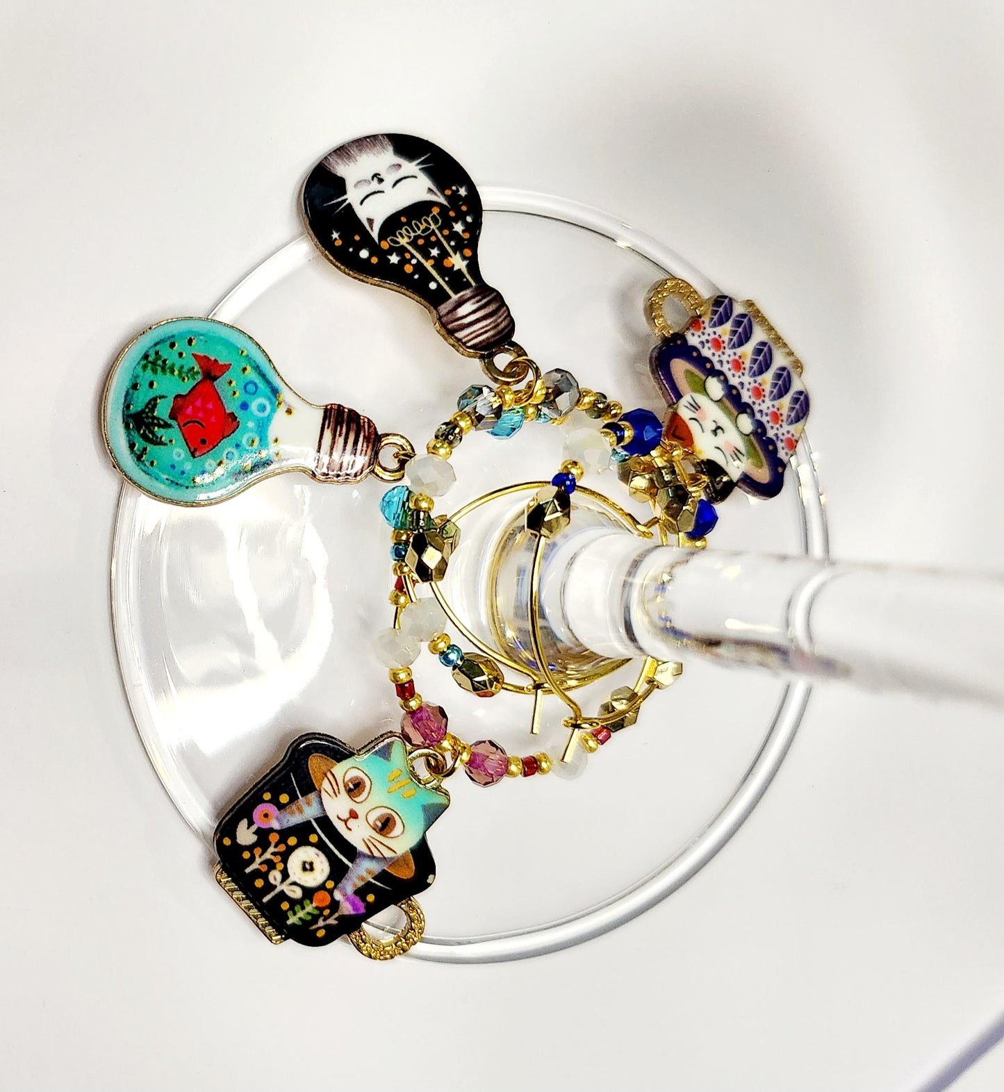 Whimsical Cat wine charms with crystal embellishments-Set of 4 gold plated wine charms in blue, grey, teal and purple crystals.
