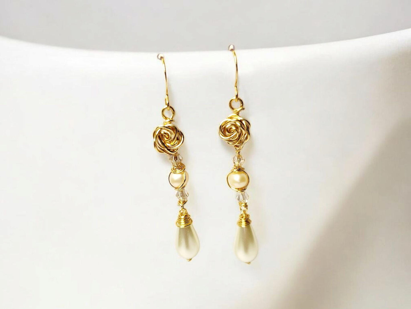 Golden Rose, with peach pearl (natural) and white pearl drop