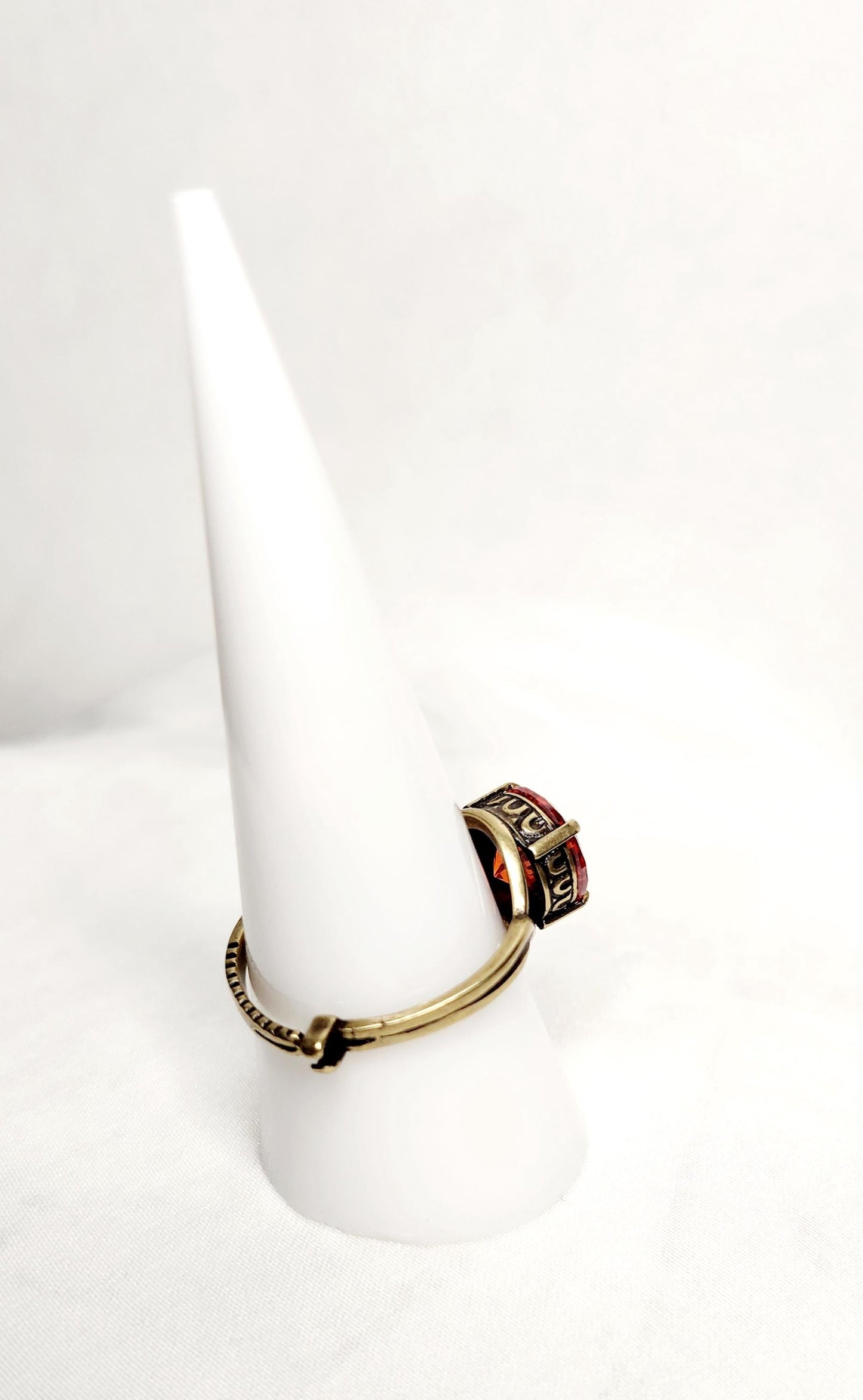 Fire Opal (10mm)set in antiqued bronze crown setting with adjustable band